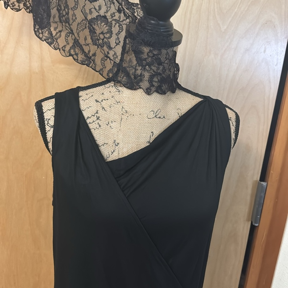 Perfectly used condition Banana Republic black wrap around tank top. Size Med.